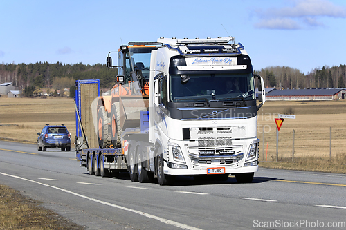 Image of Volvo Truck Semi Trailer Hauls Heavy Equipment