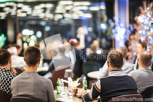 Image of Rear view of unrecognizable people at banquet business meeting event. Business and entrepreneurship events concept