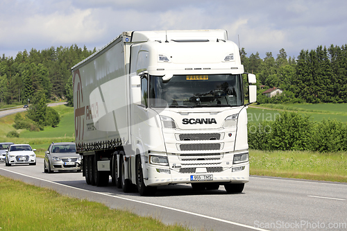 Image of White Scania R500 Truck Semi Trailer in Highway Traffic