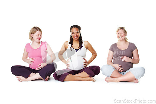 Image of Pregnant women or friends ready for yoga, pilates or birth class for help, support and community or wellness. Happy mother with smile and hope of life growth sitting on floor with white background