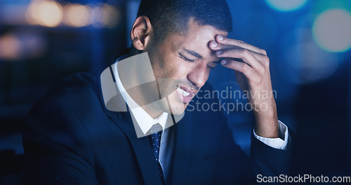 Image of Headache, stress and burnout with businessman working late night in corporate office building. Anxiety, mental health and migraine pain with audit, tax or risk company employee sitting at desktop