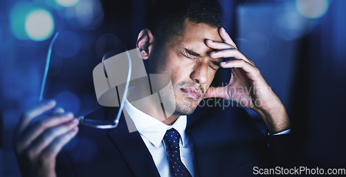Image of Eye strain, headache and office night stress of a business man working on a tax audit. Financial fintech business man with anxiety tired about finance accounting, job report and finance career
