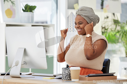 Image of Success, celebration and happy business woman reading a positive email on computer, joy and winning. Excited black employee celebrating victory, good news or promotion with victory gesture in office