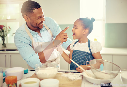 Image of Baking dad, funny daughter and flour nose messy joke from happy learning, laughing child development and bonding in kitchen. Parent, kids and family home with cute, playful and sweet comedy together