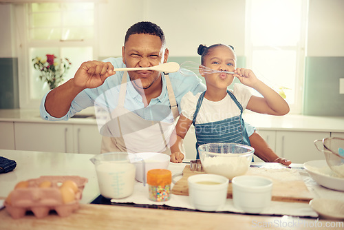 Image of Food, cooking and family with happy black father and daughter bonding and being silly in a kitchen, Single parent teaching his child how to prepare a healthy and nutrition meal, having fun at home