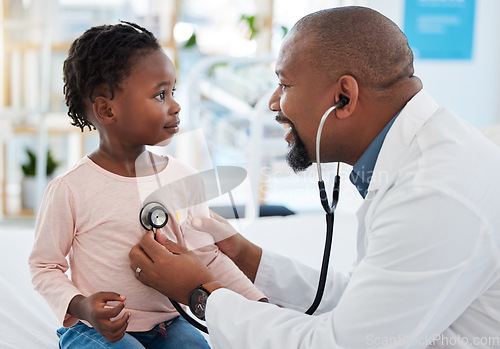 Image of Pediatrician, consulting and stethoscope for lungs or chest checkup with doctor in medical healthcare hospital or clinic. Medicine, young patient and black man therapist listening to heart of baby