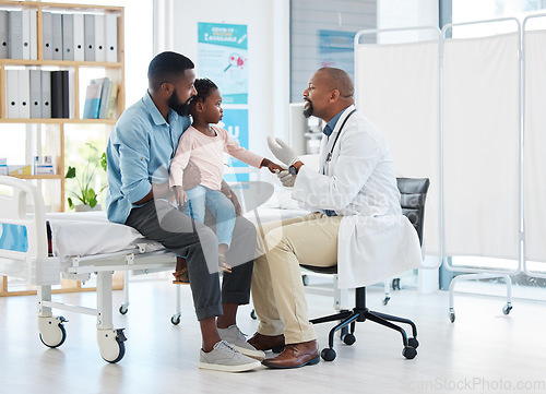 Image of Pediatrician doctor consulting black kid patient for healthcare service, medical help and wellness check in hospital clinic. Friendly, trust and kind african family gp expert for healthy child advice