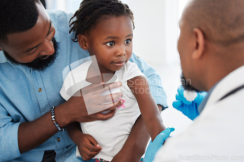 Image of Father, child in consultation with pediatrician doctor for medical healthcare, insurance and trust. Black people, girl and men consulting appointment in hospital clinic for kid or toddler vaccination