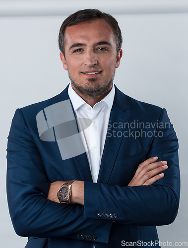 Image of Young beautiful focused european businessman. Front view of man with dark hair clothing casual business formal jacket Isolated on gray background