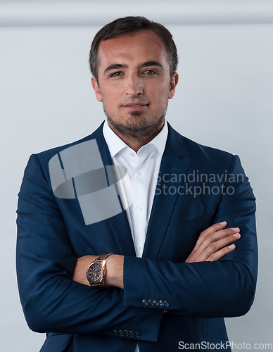 Image of Young beautiful focused european businessman. Front view of man with dark hair clothing casual business formal jacket Isolated on gray background