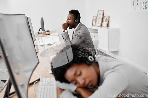 Image of Burnout, yawn and tired call center people sleeping on desk with computer in contact us, consulting and customer service office. Black woman, sleepy man or bored team workers from overworked crm task