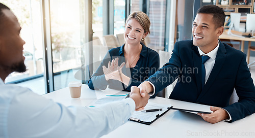 Image of Business meeting, merger and agreement at corporate desk with positive and successful result. Partnership, trust and respect gesture with hands in professional deal with b2b cooperation.