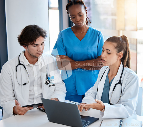 Image of Teamwork, doctors and collaboration on laptop during a meeting in a conference room. Diverse healthcare workers discussing modern treatment and innovation, brainstorming to find a cure for sickness