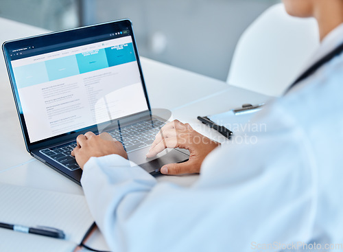 Image of Laptop, medical and healthcare with a doctor working online in an office in the hospital for medicine and insurance. Research, analysis and treatment with a female health worker at work in a clinic