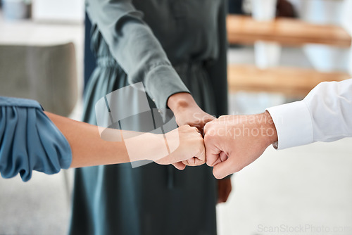 Image of Teamwork group, motivation and collaboration fist bump for trust, goal and success support. Closeup workers hands, team building and growth commitment mission, winner vision and solidarity together