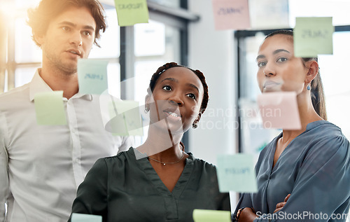 Image of Teamwork collaboration, planning strategy ideas and marketing solution in information meeting, vision and glass wall in creative agency. Diversity business people, thinking and working schedule notes