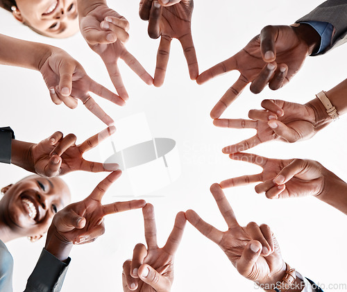Image of Teamwork, collaboration and star hand sign of business people for goal, mission and achievement success. Group diversity hands together with v sign or peace symbol for unity, trust and support below