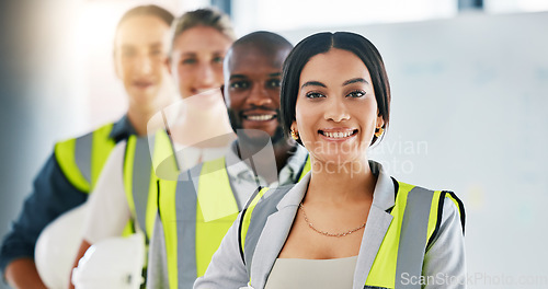 Image of Diversity, team and portrait of engineering employees standing in an industrial office. Industry workers working on a site development project together in a corporate room at the staff warehouse.