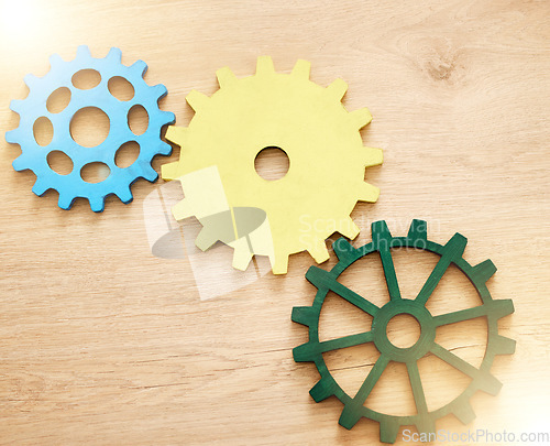 Image of Settings gear icon, abstract and illustration of cog wheel against a wooden background. Innovation, development and mechanical logo. Setup, engine and symbol for ideas with copy space mockup