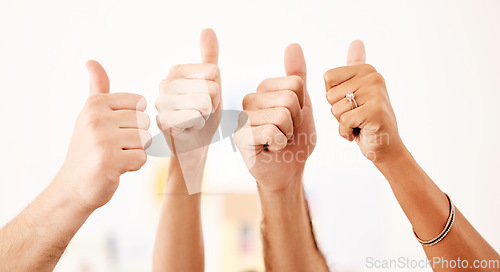 Image of Group thumbs up, vote or like hand emoji sign or gesture closeup on white wall mockup. Thank you, yes or support sign, icon or gesture for trust, agreement or social media review with mock up