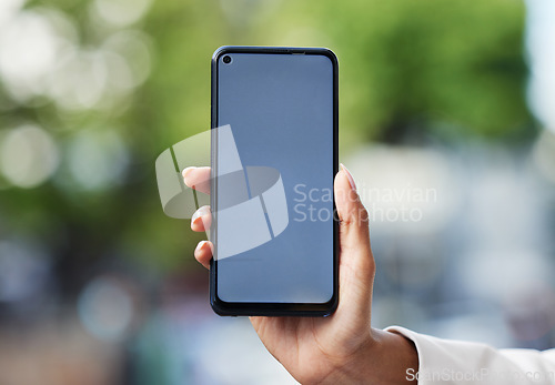 Image of Blank phone screen, mockup and marketing, advertising and mobile brand app space in urban city. Closeup hands of woman holding internet technology, social media website contact and www connect online