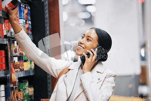 Image of Happy supermarket, grocery shopping and customer with 5g phone, smile and in retail store for food, groceries or product from shelf. Woman with smartphone, communication of sale and on call in shop