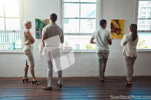 Image of Art, painting and men and women at a gallery exhibition with paintings. Culture, creativity and sales, museum visitors standing at a canvas. Beauty, presentation and discussion on creative artwork.