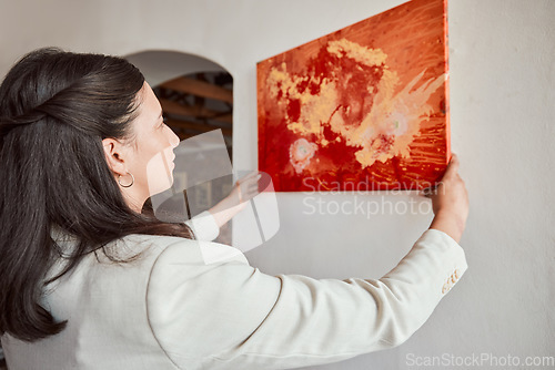 Image of Interior design, woman and wall painting in house, home and real estate sale building. Latino employee with creative vision for stage property, designer expo or art gallery exhibition in museum room
