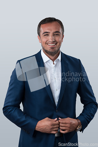 Image of Young beautiful focused european businessman. Front view of man with dark hair clothing casual business formal jacket Isolated on gray background