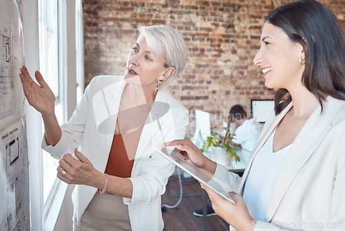 Image of Leadership, presentation and coach talking and explaining ideas, vision and strategy plan during a meeting. Senior architect showing blueprint on board during a briefing with employee with a tablet