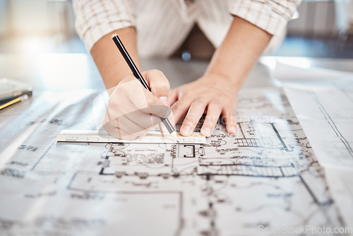Image of Architect drawing building floor plan, design blueprint map and engineer drafting structure on table paper. Real estate development work office construction and industrial wall safety ruler