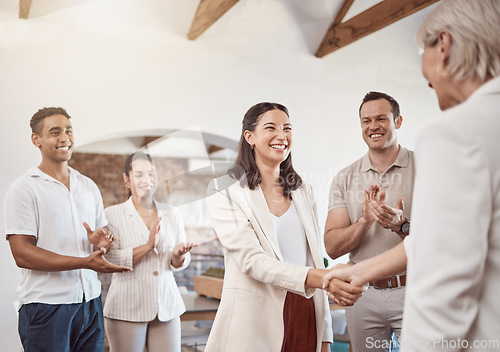 Image of Business handshake with clapping workers in the work office. Professional company b2b shaking hands for a deal to come and work together. Diverse group of happy staff thank you and welcome employee