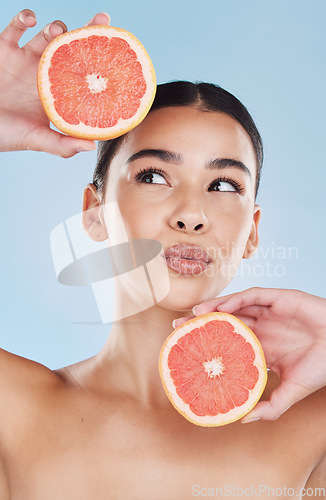 Image of Grapefruit, woman skincare and beauty of vitamin c fruit wellness, healthy complexion and natural feminine grooming. Playful, body nutrition and beautiful model for clean, organic and fresh cosmetics