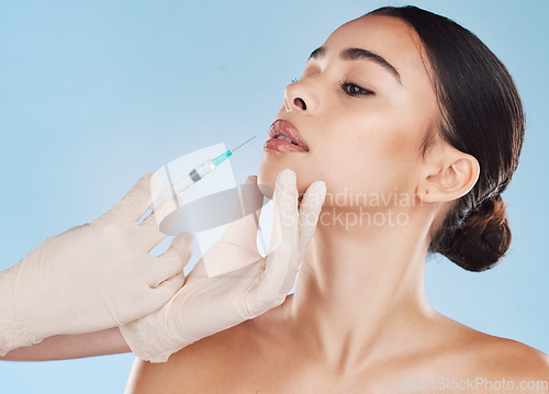 Image of Plastic surgery, syringe and lip filler on woman for facial beauty aesthetic and medical cosmetic. Hands and female face augmentation surgeon or doctor working on patient lips with injection needle.