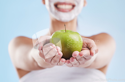 Image of Wellness, diet and skincare by woman grooming and holding an apple, happy and excited to share her diet. Young female enjoying clean eating and its skin benefits, on a cleanse, weight loss or detox