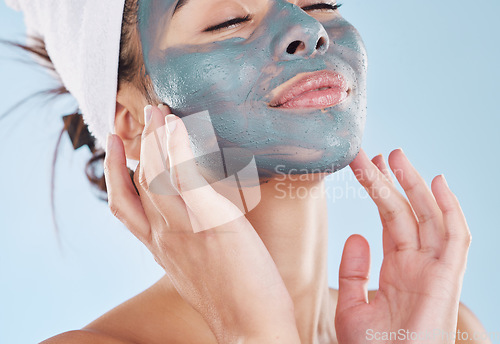 Image of Charcoal face mask for healthy skincare, wellness of facial skin and beauty product for body care against blue mockup studio background. Mock up of relax, cosmetic and lifestyle model with treatment