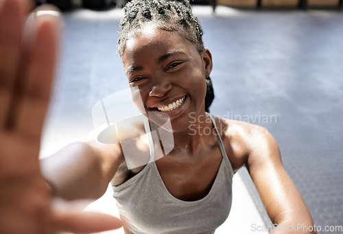 Image of Fitness, happy and black woman taking a selfie in the gym after training, exercise and workout alone. Smile, healthy and young African woman influencer, wellness and active lifestyle on social media