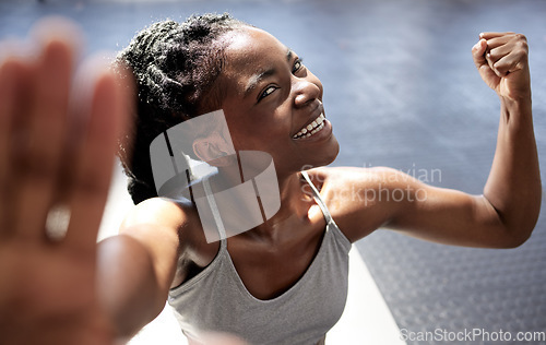 Image of Fitness motivation, strong muscle and workout woman from Jamaica happy after a gym exercise. Selfie of a athlete with a smile before training, boxing and sports wellness exercise with a fist