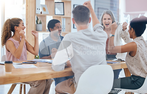 Image of Business people celebration for goals, motivation and target in a planning meeting at work. Professional advertising and marketing workers cheering and happy for success express support in an office