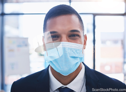 Image of Businessman with a covid face mask and happy portrait for vision, goal and motivation for job, career or work growth. Young corporate worker working in coronavirus pandemic with safety and compliance