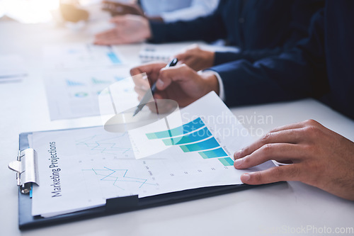Image of Marketing chart graphs, sales and advertising goals or projections checklist and paperwork results by the manager. Employee reading financial profit data analytics while planning a finance strategy