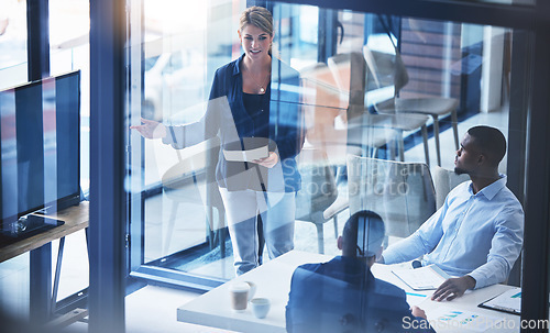 Image of Presentation, leader and coach talking and pointing at tv screen for marketing and advertising strategy during training workshop. Woman discussing financial growth during briefing with analyst staff