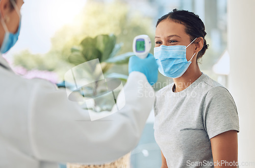 Image of Covid, mask and doctor thermometer test with patient for virus scan check and consultation. Healthcare worker safety monitor protocol for the prevention of serious illness and hospital care.