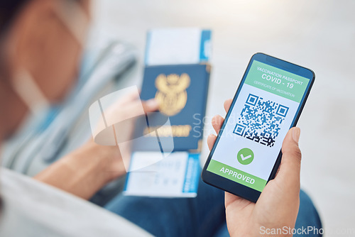 Image of Covid vaccine passport on a phone for travel, safety or security in global pandemic. Airport, smartphone app with digital health certificate qr code and South Africa book for international traveling