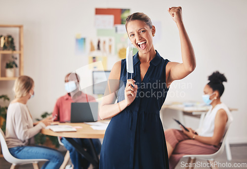 Image of Woman, business portrait and mask victory with pandemic regulations health safety news update. Excited fist for Covid social distance guidelines change in a public and corporate environment.