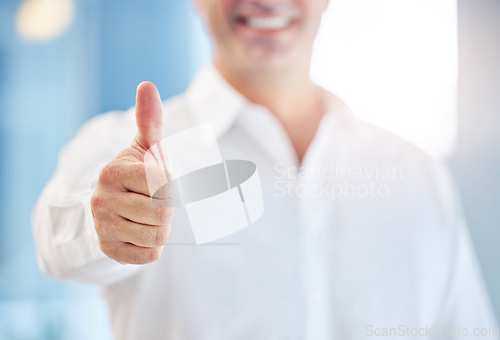 Image of Thumbs up, thank you and yes with happy, smile and winner sign of professional businessman. Success, vote and good news with closeup of male hand in agreement, goal review and motivation