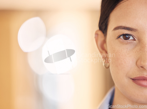 Image of Half face, power and woman or model, serious and vision for success over bokeh background. Portrait of a female facial in wellness in feminine voice protest, empowerment and courage or focused.