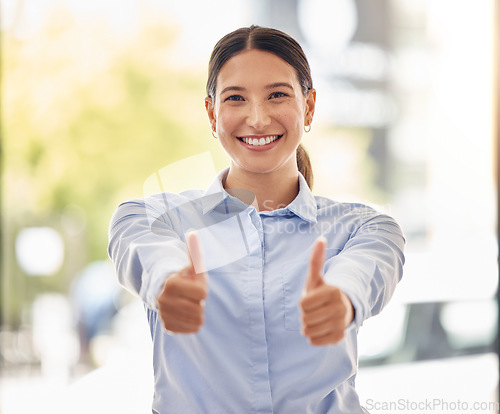 Image of Thumbs up emoji for motivation, success and praise for support, luck and thanks. Portrait of happy, smile and excited business woman, winner and worker with goal, yes feedback and trust for good news