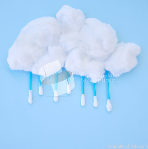 Image of Ear cotton buds for healthcare, covid test or flu season awareness project on blue background studio. Medical or cosmetics products used for clean, hygiene or health with mock up and design