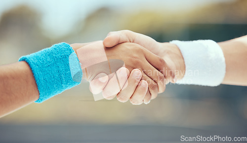 Image of Handshake, teamwork and sport with the hands of sports people in collaboration outside after a game or match. Sportsmanship, fitness and exercise with friends playing or competing outdoors in the day